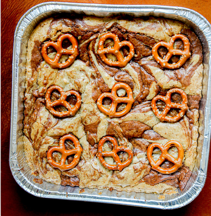 Overhead of pretzel swirl brownies in a pan.