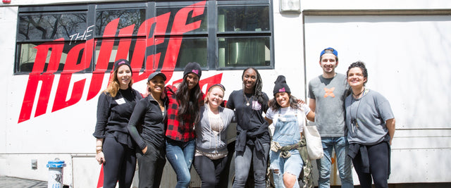 A team photo at a volunteer event.